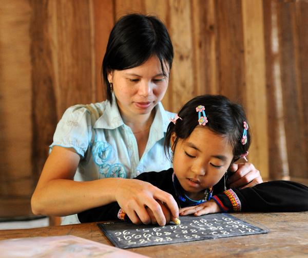 Second mothers of Sila ethnic minority children